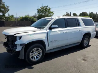 2015 Chevrolet Suburban LT with VIN 1GNSCJKCXFR581077, listed as a Copart auction lot 55631105 with 194,771 mi miles and Salvage title. Bid and sale history available at DreamBid. Image 1.