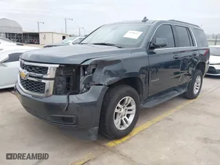 2019 Chevrolet Tahoe LT with VIN 1GNSCBKC8KR366460, listed as a IAAI auction lot 41384327 with 76,861 mi miles. Bid and sale history available at carsss.com. Image 2.