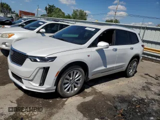 2020 Cadillac XT6 FWD Premium Luxury z VIN 1GYKPCRS1LZ232773, wystawiony jako Copart lot #61201565 z przebiegiem 15 866 mil mil oraz Szkoda całkowita • Salvage title. Historia ofert i sprzedaży dostępna na DreamBid. Obrazek 1.