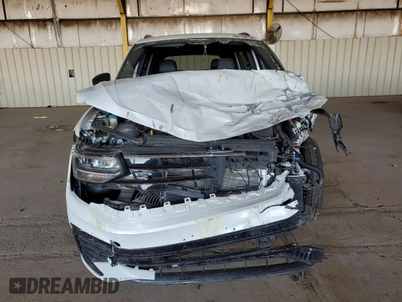 2024 Volkswagen Tiguan SE R-Line Black with VIN 3VVCB7AX6RM011544, listed as a Copart auction lot 66198745 with 23,609 mi miles and Salvage title. Bid and sale history available at DreamBid. Image 5.