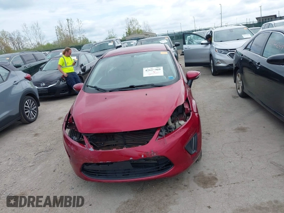2013 Ford Fiesta SE with VIN 3FADP4EJXDM152463, listed as a IAAI auction lot 42122969 with 66,952 mi miles and . Bid and sale history available at DreamBid. Image 13.