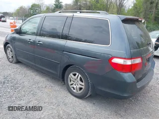 2005 Honda Odyssey EX with VIN 5FNRL38495B004614, listed as a IAAI auction lot 42128185 with 230,247 mi miles. Bid and sale history available at carsss.com. Image 3.