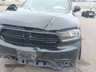 2014 Dodge Durango SXT with VIN 1C4RDJAG1EC552075, listed as a IAAI auction lot 42292301 with 122,427 mi miles and . Bid and sale history available at DreamBid. Image 6.