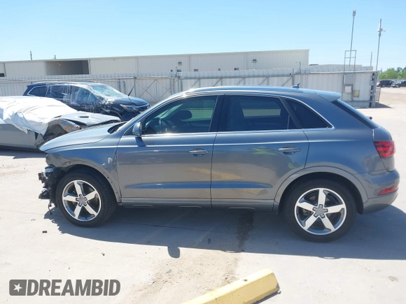 2015 Audi Q3 Prestige with VIN WA1GFCFS7FR013818, listed as a IAAI auction lot 41975076 with 60,295 mi miles and . Bid and sale history available at DreamBid. Image 15.