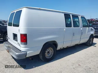 2002 Ford Econoline Cargo with VIN 1FTRE14272HA57164, listed as a IAAI auction lot 42071945 with 236,387 mi miles. Bid and sale history available at carsss.com. Image 4.
