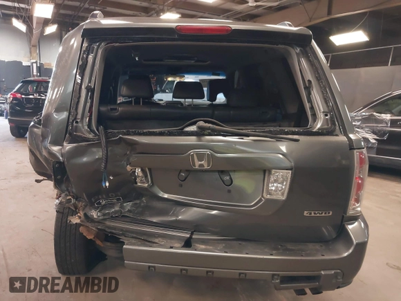2007 Honda Pilot EX-L z VIN 2HKYF18687H533288, wystawiony jako IAAI lot #42046152 z przebiegiem 165 953 mil mil oraz . Historia ofert i sprzedaży dostępna na DreamBid. Obrazek 16.