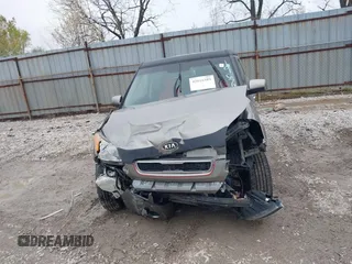 2011 Kia Soul + with VIN KNDJT2A24B7196798, listed as a IAAI auction lot 42016389 with 153,829 mi miles. Bid and sale history available at carsss.com. Image 6.