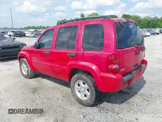 2004 Jeep Liberty Limited with VIN 1J4GK58K94W283166, listed as a IAAI auction lot 42154061 with 206,413 mi miles. Bid and sale history available at carsss.com. Image 3.