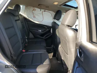 2014 Mazda CX-5 Grand Touring with VIN JM3KE2DY8E0412025, listed as a Copart auction lot 42863655 with 72,416 mi miles and Salvage Title. Bid and sale history available at carsss.com. Image 10.