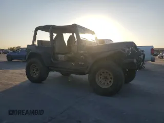 2000 Jeep Wrangler Sport with VIN 1J4FA49S0YP770943, listed as a Copart auction lot 79072624 with 165,377 mi miles and Clean Title. Bid and sale history available at carsss.com. Image 4.