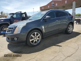 2012 Cadillac SRX Performance Collection z VIN 3GYFNEE31CS602568, wystawiony jako Copart lot #54751375 z przebiegiem 144 228 mil mil oraz Szkody całkowita. Historia ofert i sprzedaży dostępna na DreamBid. Obrazek 1.