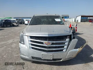 2016 Cadillac Escalade Luxury Collection z VIN 1GYS4BKJ7GR315425, wystawiony jako IAAI lot #41835277 z przebiegiem 176 753 mil mil oraz . Historia ofert i sprzedaży dostępna na DreamBid. Obrazek 12.