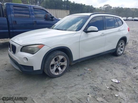 2013 BMW X1 28i with VIN WBAVM1C59DVW44965, listed as a IAAI auction lot 41951047 with 122,191 mi miles. Bid and sale history available at carsss.com. Image 2.