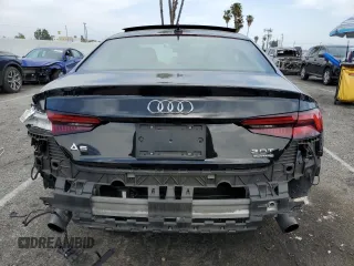 2018 Audi A5 Premium z VIN WAUNNAF59JA049769, wystawiony jako Copart lot #53304215 z przebiegiem 50 572 mil mil oraz Szkoda całkowita • Salvage title. Historia ofert i sprzedaży dostępna na DreamBid. Obrazek 6.