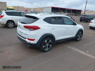 2016 Hyundai Tucson Limited with VIN KM8J33A22GU130857, listed as a IAAI auction lot 41821095 with 78,894 mi miles. Bid and sale history available at carsss.com. Image 4.