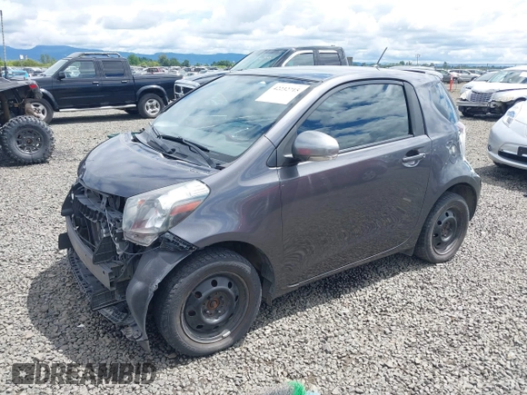 2012 Scion iQ with VIN JTNJJXB00CJ018659, listed as a IAAI auction lot 42232715 with 142,516 mi miles and . Bid and sale history available at DreamBid. Image 18.