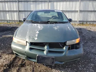 1996 Dodge Stratus z VIN 1B3EJ46XXTN285619, wystawiony jako Copart lot #78267884 z przebiegiem Nie podano mil oraz Szkoda całkowita • Salvage title. Historia ofert i sprzedaży dostępna na DreamBid. Obrazek 5.