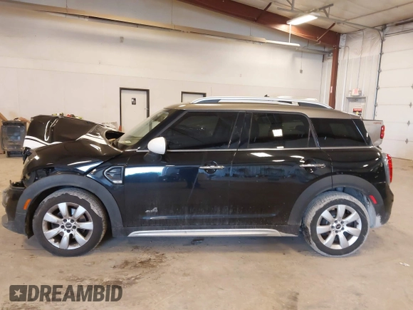 2019 MINI Countryman Cooper with VIN WMZYV5C53K3E05041, listed as a IAAI auction lot 41684566 with 65,237 mi miles. Bid and sale history available at carsss.com. Image 14.