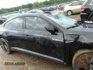 2019 Volkswagen Arteon SEL R-Line z VIN WVWSR7AN5KE006772, wystawiony jako IAAI lot #42353502 z przebiegiem Nie podano mil oraz . Historia ofert i sprzedaży dostępna na DreamBid. Obrazek 12.