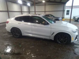 2020 BMW X4 M40i with VIN 5UX2V5C04L9C04255, listed as a IAAI auction lot 41574802 with 35,101 mi miles and . Bid and sale history available at DreamBid. Image 14.