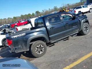 2019 Toyota Tacoma 4WD SR with VIN 3TMCZ5ANXKM267043, listed as a IAAI auction lot 41581155 with NaN miles. Bid and sale history available at carsss.com. Image 4.