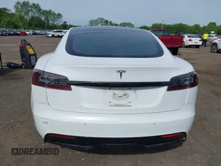 2022 Tesla Model S with VIN 5YJSA1E58NF467644, listed as a IAAI auction lot 42344403 with 52,628 mi miles and . Bid and sale history available at DreamBid. Image 16.
