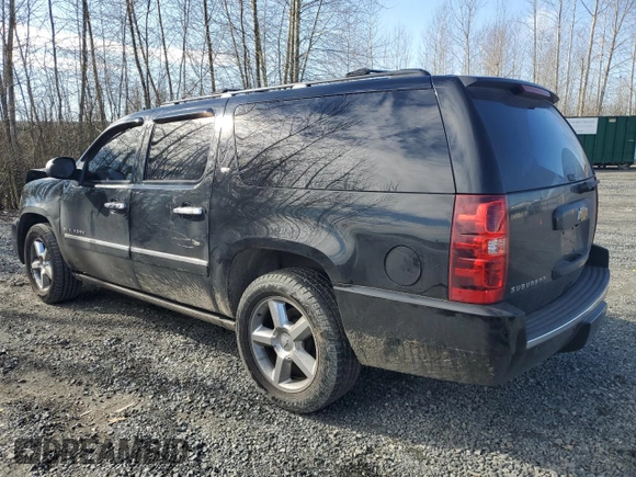 2014 Chevrolet Suburban LTZ with VIN 1GNSCKE08ER230741, listed as a Copart auction lot 47234095 with 184,263 mi miles and Salvage title. Bid and sale history available at DreamBid. Image 2.