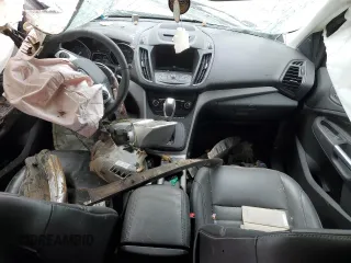 2016 Ford Escape SE с VIN 1FMCU9G99GUC88965, выставлен на аукционе Copart как лот 49808165 с пробегом 96 016 миль миль и На запчасти • Non repairable. История ставок и продаж доступна на DreamBid. Изображение 8.