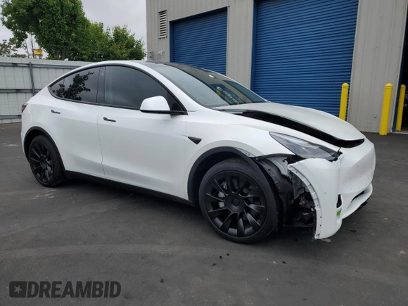 2023 Tesla Model Y Long Range with VIN 7SAYGDEEXPF744472, listed as a Copart auction lot 54109315 with 15,404 mi miles and Salvage Title. Bid and sale history available at DreamBid. Image 4.