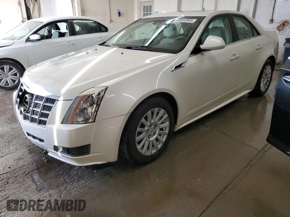 2012 Cadillac CTS Luxury with VIN 1G6DG5E57C0125969, listed as a Copart auction lot 49002865 with 105,800 mi miles and Salvage Title. Bid and sale history available at DreamBid. Image 1.