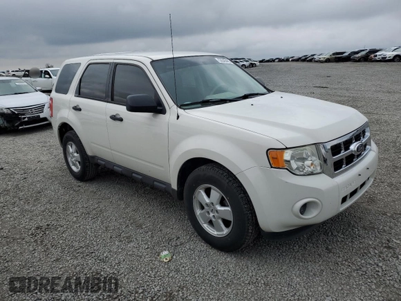 2011 Ford Escape XLS with VIN 1FMCU0C71BKB89898, listed as a Copart auction lot 52240445 with 180,201 mi miles and Salvage title. Bid and sale history available at DreamBid. Image 4.