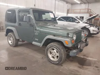 1999 Jeep Wrangler Sport with VIN 1J4FY19S0XP496555, listed as a IAAI auction lot 42110414 with 125,500 mi miles. Bid and sale history available at carsss.com. Image 1.