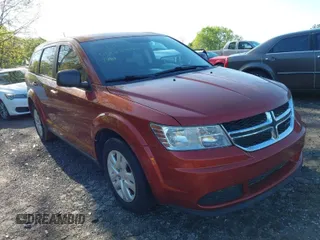 2014 Dodge Journey SE with VIN 3C4PDCAB9ET245801, listed as a IAAI auction lot 41982250 with 119,468 mi miles and . Bid and sale history available at carsss.com. Image 1.