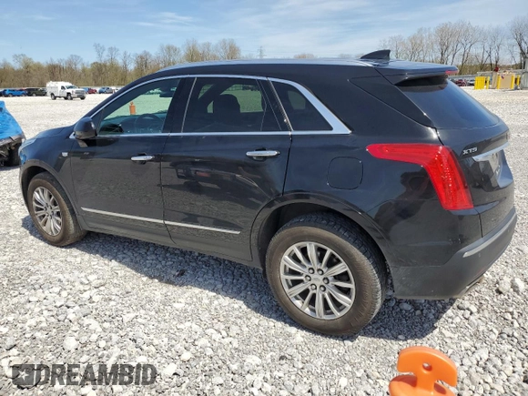 2017 Cadillac XT5 FWD with VIN 1GYKNARS2HZ131243, listed as a Copart auction lot 54189395 with 134,324 mi miles and Salvage Title. Bid and sale history available at DreamBid. Image 2.
