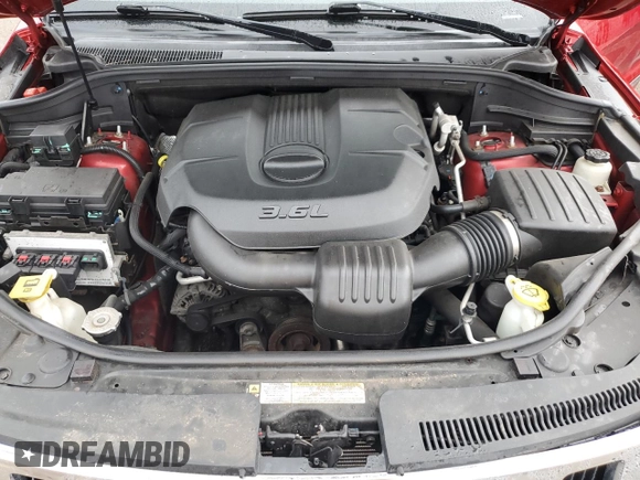 2011 Jeep Grand Cherokee Laredo with VIN 1J4RR4GG4BC569808, listed as a Copart auction lot 56040105 with 167,067 mi miles and Salvage title. Bid and sale history available at DreamBid. Image 12.