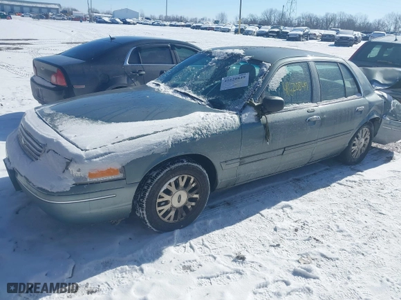 2005 Ford Crown Victoria LX with VIN 2FAFP74W85X131494, listed as a IAAI auction lot 41620849 with 127,245 mi miles. Bid and sale history available at carsss.com. Image 2.