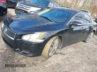 2014 Nissan Maxima S with VIN 1N4AA5AP0EC909054, listed as a IAAI auction lot 41581084 with 68,667 mi miles and . Bid and sale history available at DreamBid. Image 2.