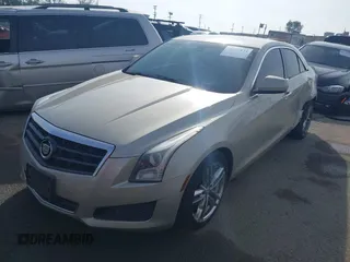 2013 Cadillac ATS with VIN 1G6AA5RX0D0156806, listed as a IAAI auction lot 41462134 with 138,323 mi miles and . Bid and sale history available at DreamBid. Image 2.