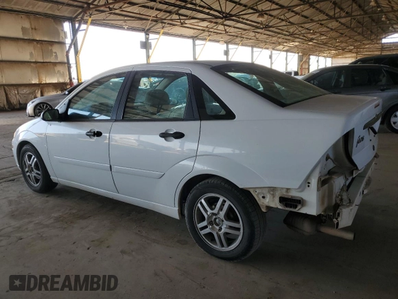 2002 Ford Focus SE with VIN 1FAFP343X2W156824, listed as a Copart auction lot 54834615 with 248,849 mi miles and Salvage Title. Bid and sale history available at carsss.com. Image 2.