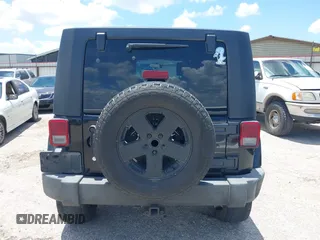 2007 Jeep Wrangler Unlimited Sahara with VIN 1J4GA59187L187656, listed as a IAAI auction lot 42554114 with 200,840 mi miles and . Bid and sale history available at DreamBid. Image 16.