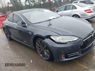 2014 Tesla Model S P85D with VIN 5YJSA1H26EFP66115, listed as a IAAI auction lot 41862071 with 105,362 mi miles and . Bid and sale history available at DreamBid. Image 1.