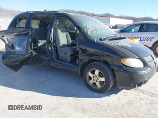 2005 Dodge Caravan SXT with VIN 2D4GP44L75R219429, listed as a IAAI auction lot 41700457 with 238,120 mi miles. Bid and sale history available at carsss.com. Image 1.