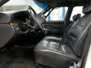 1998 Oldsmobile 88 LS z VIN 1G3HN52K9W4823866, wystawiony jako Copart lot #49150535 z przebiegiem 54 125 mil mil oraz Szkody całkowita. Historia ofert i sprzedaży dostępna na DreamBid. Obrazek 7.