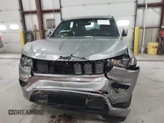 2018 Jeep Grand Cherokee Laredo E with VIN 1C4RJFAG6JC102969, listed as a IAAI auction lot 41963137 with 112,361 mi miles and . Bid and sale history available at DreamBid. Image 12.