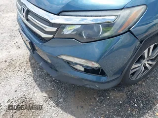 2018 Honda Pilot EX-L with VIN 5FNYF6H53JB006219, listed as a IAAI auction lot 42469399 with 134,214 mi miles and . Bid and sale history available at DreamBid. Image 6.