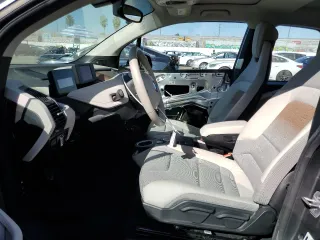 2019 BMW i3 with VIN WBY8P4C51K7E84270, listed as a Copart auction lot 77707224 with 15,584 mi miles and Salvage Title. Bid and sale history available at carsss.com. Image 7.
