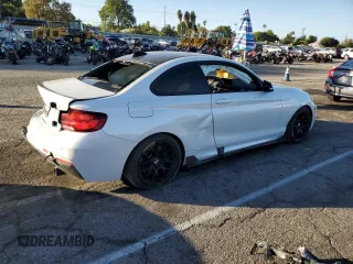 2020 BMW 2 Series M240i with VIN WBA2J5C05L7D82973, listed as a Copart auction lot 79058904 with 29,054 mi miles and Salvage Title. Bid and sale history available at carsss.com. Image 3.