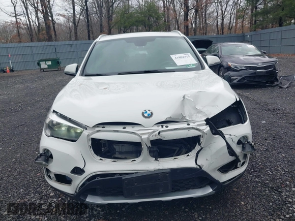 2018 BMW X1 xDrive28i with VIN WBXHT3C36J5L32162, listed as a IAAI auction lot 41802315 with 80,422 mi miles. Bid and sale history available at carsss.com. Image 12.