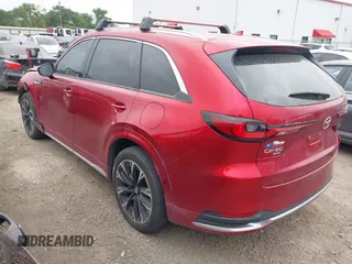 2024 Mazda CX-90 S z VIN JM3KK1HC2R1133087, wystawiony jako IAAI lot #41955750 z przebiegiem 24 217 mil mil oraz . Historia ofert i sprzedaży dostępna na DreamBid. Obrazek 3.