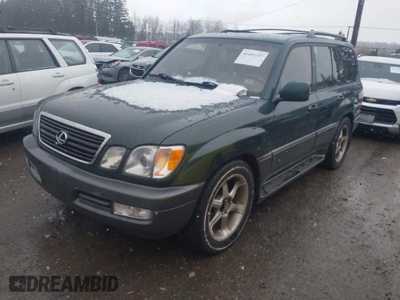 2000 Lexus LX with VIN JT6HT00W3Y0124104, listed as a IAAI auction lot 41493749 with 253,161 mi miles. Bid and sale history available at carsss.com. Image 2.
